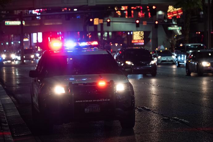 black car on road during night time